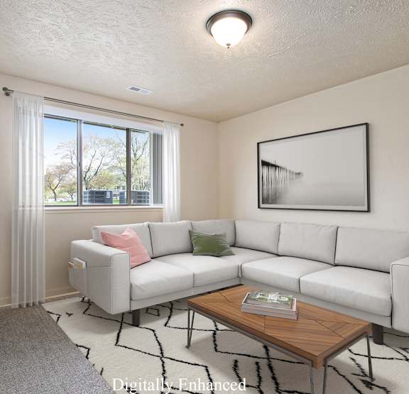 a bedroom with a bed and a ceiling fan