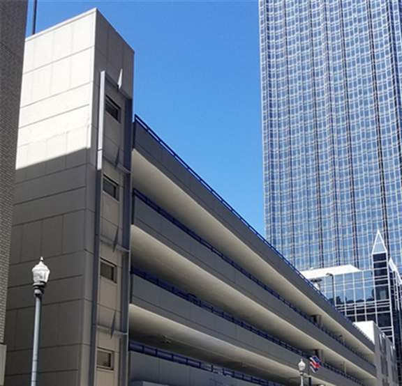 A parking garage with a car parked in front of it.  at The Commonwealth Building, Pittsburgh, 15222