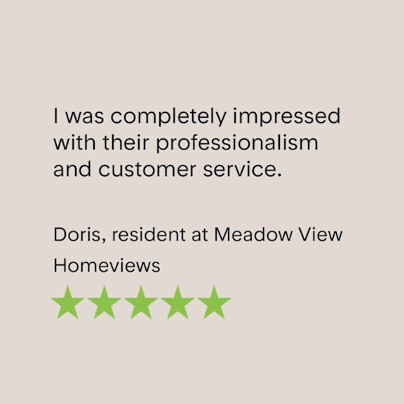 A customer review from Doris, a resident at Meadow View Homeviews, praises the professionalism and customer service.