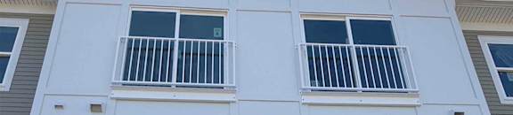 Exterior front of building with windows
