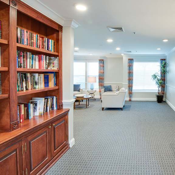 Community space with library and seating area