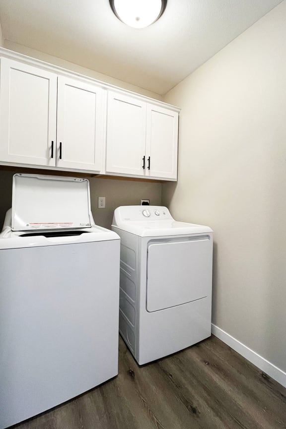 a bathroom with a toilet and a sink and a bath tub