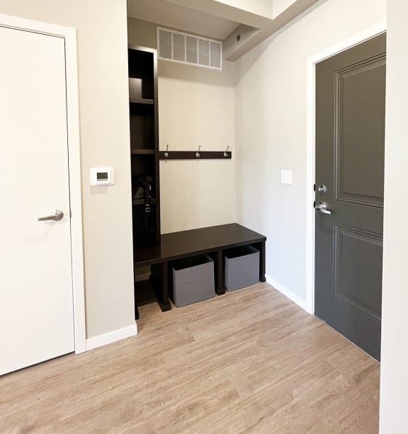 a bedroom with a bed and a ceiling fan