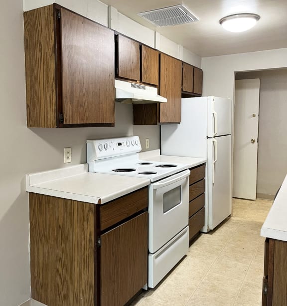 a bedroom with a bed and a ceiling fan