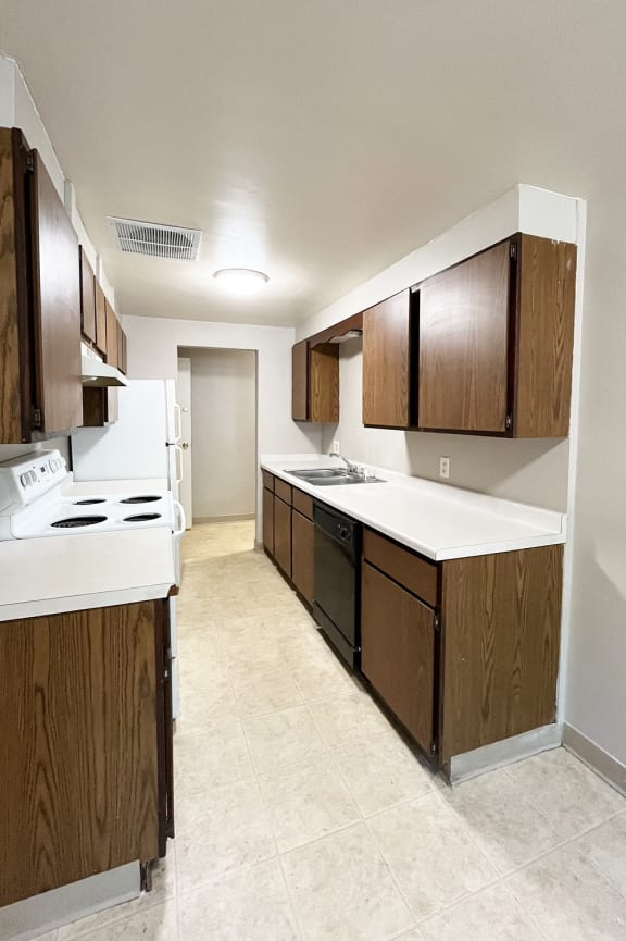 a bathroom with a toilet and a sink and a bath tub