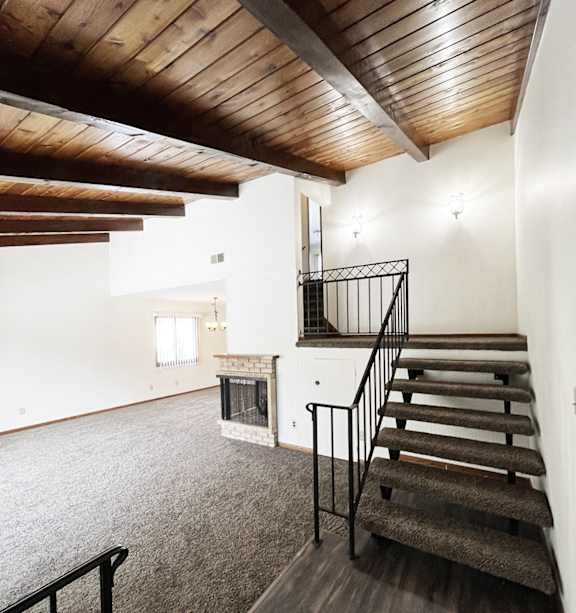 a bedroom with a bed and a ceiling fan