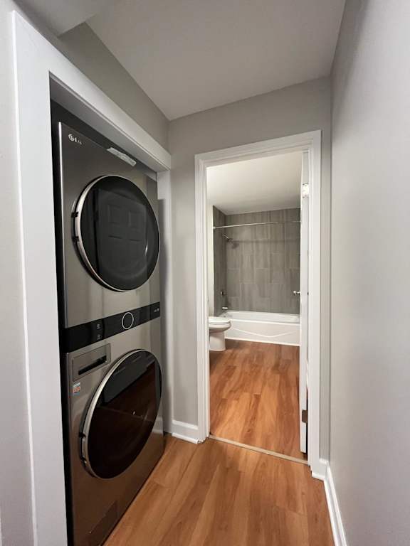 A small laundry room with a washer and dryer.