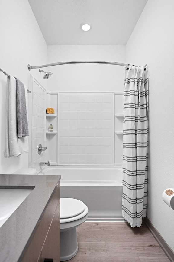 a small bathroom with a shower and a toilet  at Slate at Fishers District, Indiana, 46037