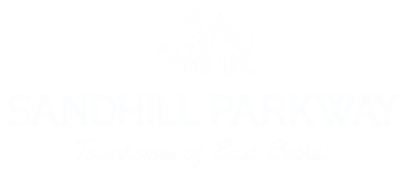 the logo or sign for the hotel at Sandhill Parkway Townhomes Apartments, East Bethel, Minnesota