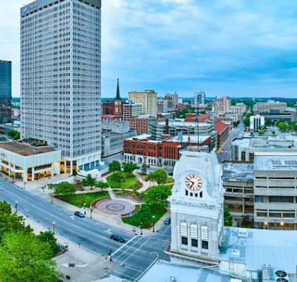 A cityscape with a mix of modern and traditional architecture.