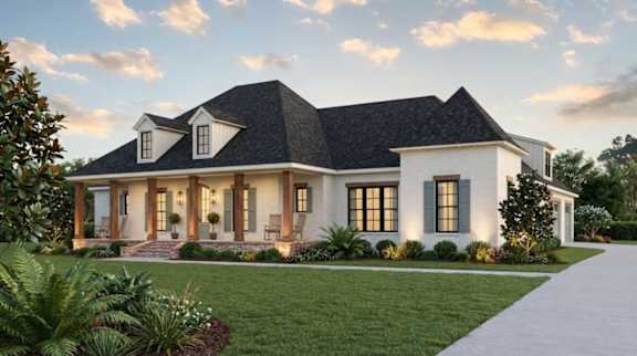 A large white house with a black roof and a long driveway.