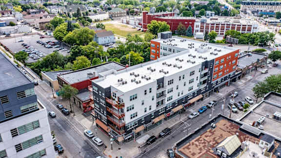 an aerial view of a building in the city
