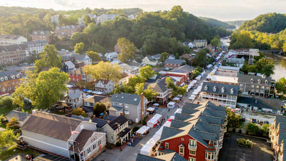 A small town with a mix of residential and commercial buildings.
