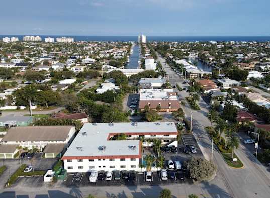 A view of a city with a large building in the center.