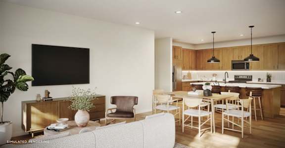 Rendering of open-concept townhome apartment living and dining area with wood cabinetry, kitchen island seating, and large wall-mounted TV.