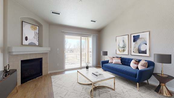 A modern living room with a bar area and a television.