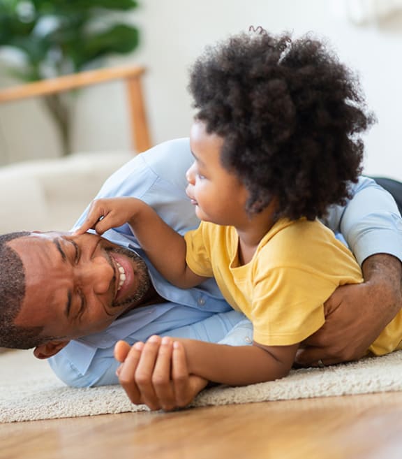 Man Playing With His Kid