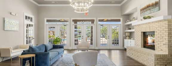 a bedroom with a bed and a ceiling fan at Uphill Flats, Decatur, GA