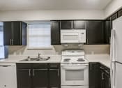 Thumbnail 21 of 33 - Kitchen and dining area