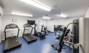 Thumbnail 2 of 8 - a room filled with lots of different types of exercise equipment