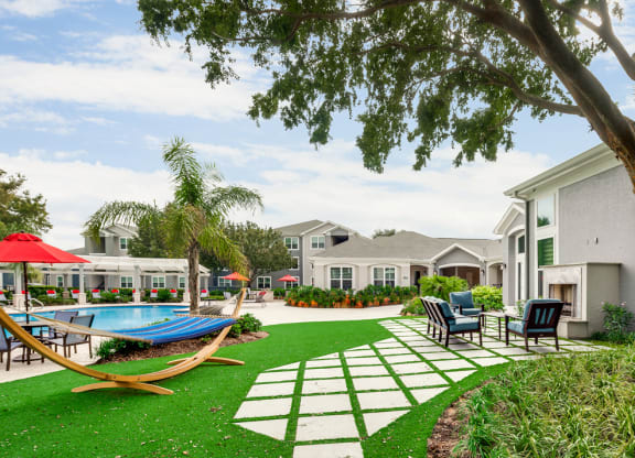 Bahia Cove Apartments Outdoor Fireplace and Seating Area