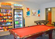 Thumbnail 10 of 17 - Game room at The Laurel Apartments, Missouri