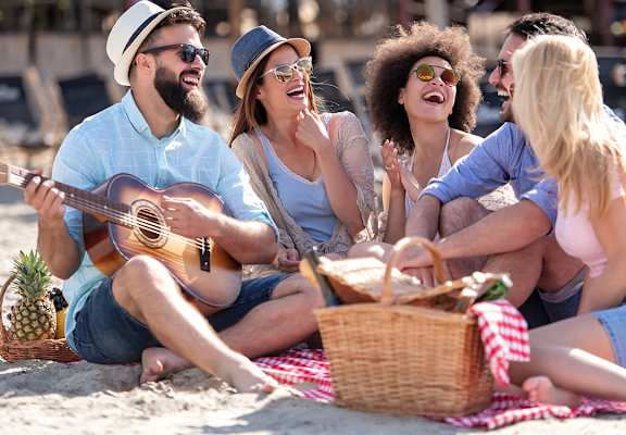 Friends having a picnic  at Hibiscus Pointe, Miami Florida