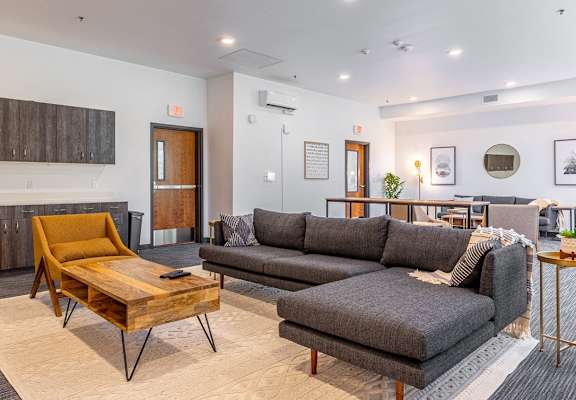 a living room with a couch and a coffee table
