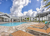 Thumbnail 12 of 44 - Coralina Apartments | Cape Coral, FL | Island-Style Lagoon Pool