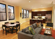 Thumbnail 16 of 17 - Living Room With Kitchen at The Laurel Apartments, Saint Louis