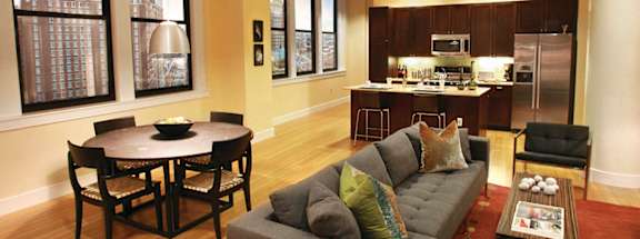 Living Room With Kitchen at The Laurel Apartments, Saint Louis, Missouri