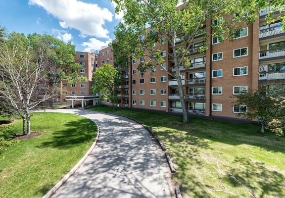 Green Spaces With Mature Trees at 1310 Archibald Apartment, Winnipeg, MB