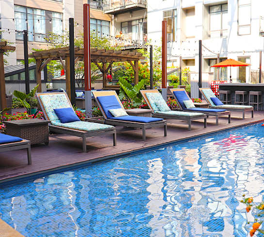 Pool With Sundecks at The Laurel Apartments, Saint Louis