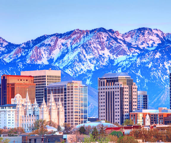 the skyline with the mountains in the background