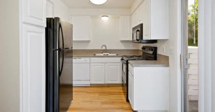 Sugar Pine Townhomes Kitchen with Private Patio