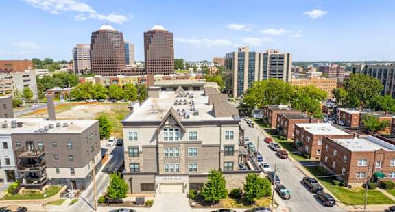 A view of a city from a high angle with a building in the foreground.at Mirabelle Luxury Apartments, Kansas City