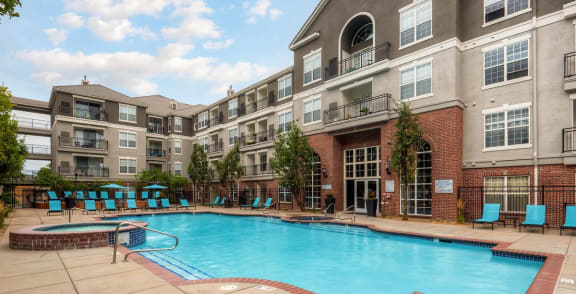 our apartments offer a swimming pool in front of our building at Viridian in Greenwood Village, CO
