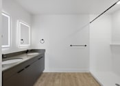 Thumbnail 37 of 51 - A bathroom with a white wall and a black line on it at Brickside Heights, Utah, 84106