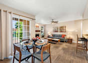 Thumbnail 7 of 24 - Spacious Apartment Dining Room with Faux Wood Flooring