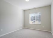 Thumbnail 6 of 8 - a bedroom with a large window