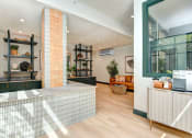 Thumbnail 13 of 33 - resident lounge area with coffee station