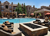 Thumbnail 1 of 17 - Resort-Style Swimming Pool and Sundeck at Apartment Homes in Cherry Creek School District