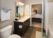 Thumbnail 6 of 19 - Upscale Bathroom with Undermount Sink at Colorado Springs Apartments in El Paso County