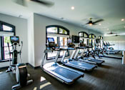 Thumbnail 19 of 26 - Fitness Center with Peloton Machines at Apartments for Rent Near Emory University 30329