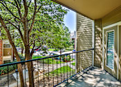 Thumbnail 12 of 21 - Patio and balcony at apartments Valley Ranch Irving TX
