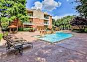 Thumbnail 13 of 21 - Relaxing pool sundeck at apartments near love Field Airport