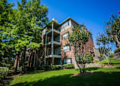 Thumbnail 16 of 21 - Exterior of MacArthur Ridge Apartments near Coppell Texas