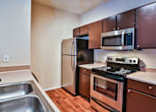 Thumbnail 9 of 21 - Upgraded kitchen with new appliances at Best apartments in Irving TX
