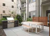 Thumbnail 11 of 31 - Courtyard Outdoor Kitchen at The Baldwin at St. Paul Square, San Antonio, 78205