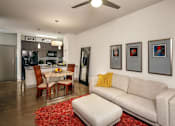Thumbnail 7 of 28 - Spacious Living Room with Ceiling Fan at Apartments Cedar Springs
